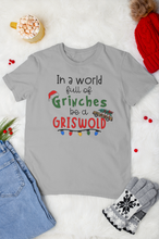 Load image into Gallery viewer, In a world of grinches be a Griswold
